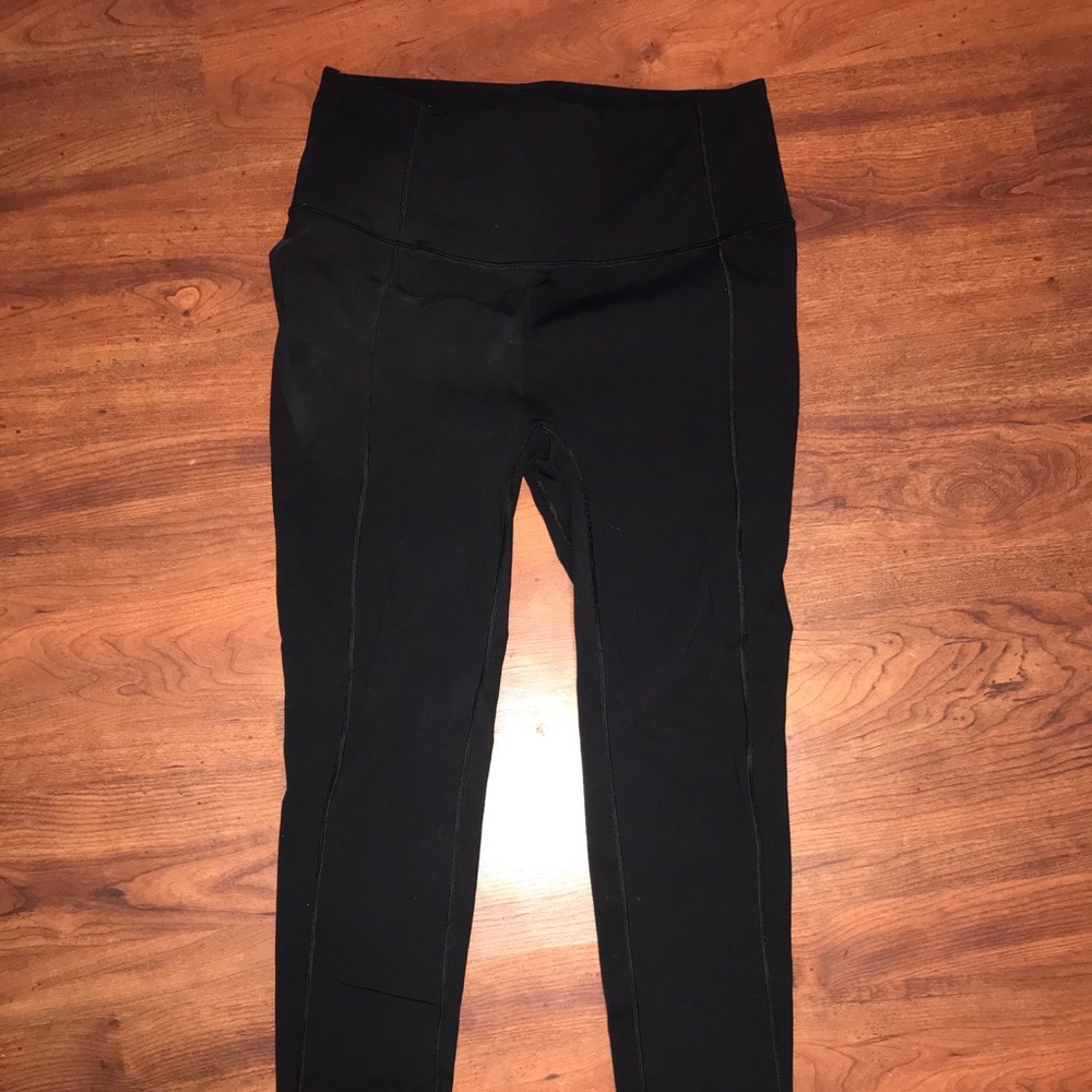 Lululemon leggings.  Not sure what style they are